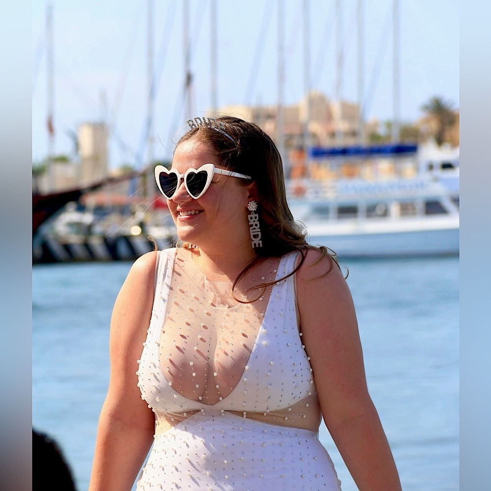 Sleeveless pearl and rhinestone cover-up